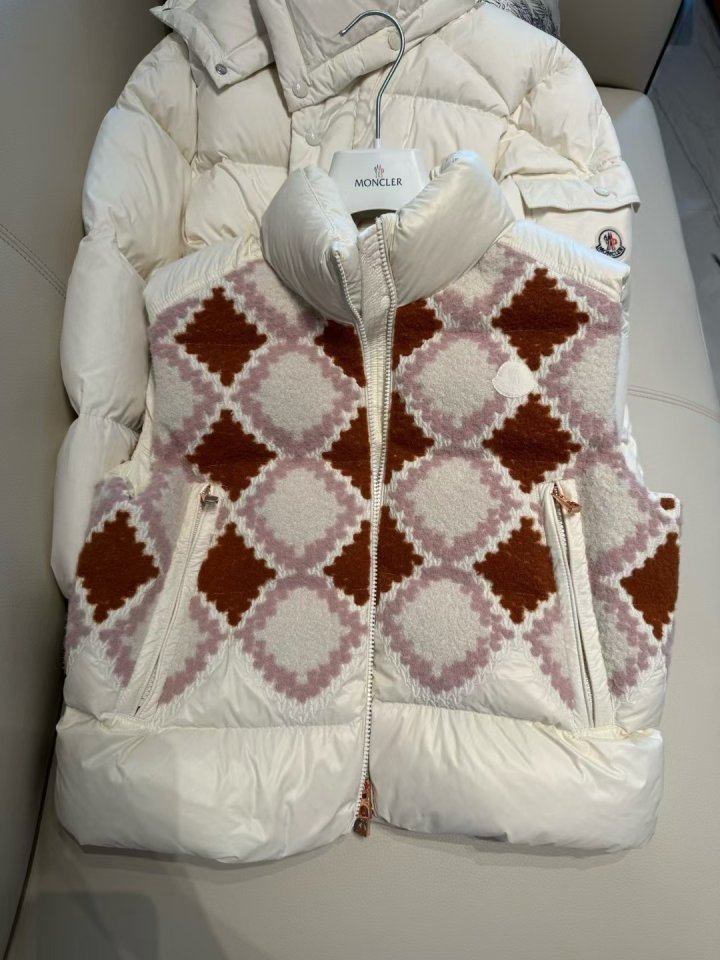 기하 패턴 패딩 베스트